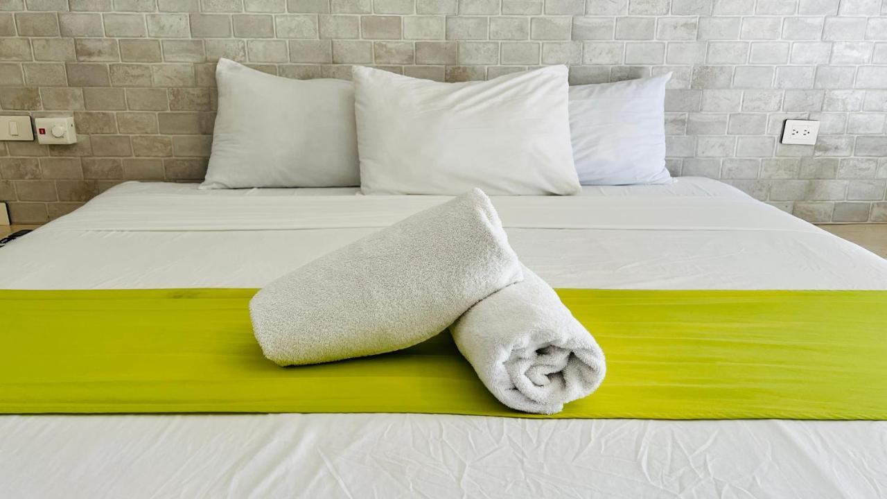 Hotel Mayari Holbox Ngoại thất bức ảnh Bath towels on a bed